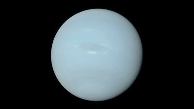 Neptune has seen by Voyager 2 a pale blue planets with few slightly darker storms