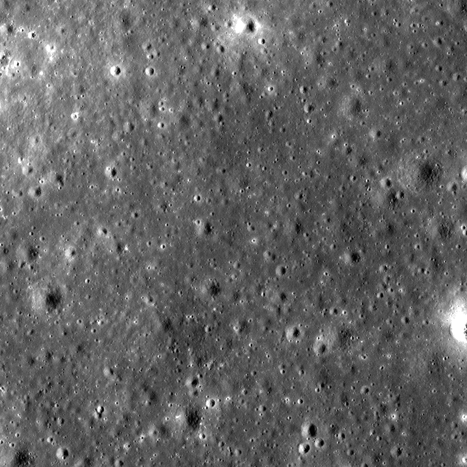A before and after image of the new McGretchin Crater, first showing a bumpy but uniform picture of thelunar surface and then showing a large circular dent and much lighter debris ejected in huge circle around it. A before and after image of the new McGretchin Crater, first showing a bumpy but uniform picture of thelunar surface and then showing a large circular dent and much lighter debris ejected in huge circle around it.