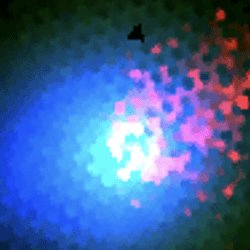 Interstellar comet 3I/ATLAS imaged in three colors.