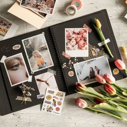 photo album scrapbook with images, flowers, and washi tape