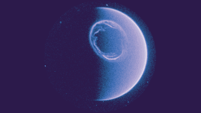 A square blue image, with a little over half of Earth taking up most of the image. Earth looks like how we see the Moon when it is waxing or waning at just over a half-Moon. Because this is an ultraviolet image, Earth does not appear in its usual colours, but is light blue with a white ring. This ring is about a third of the size of the face of Earth that we see, and is quite swirly, like clouds or dye being mixed with water. The background of the image is dark blue, with some tiny white dots: these are stars.