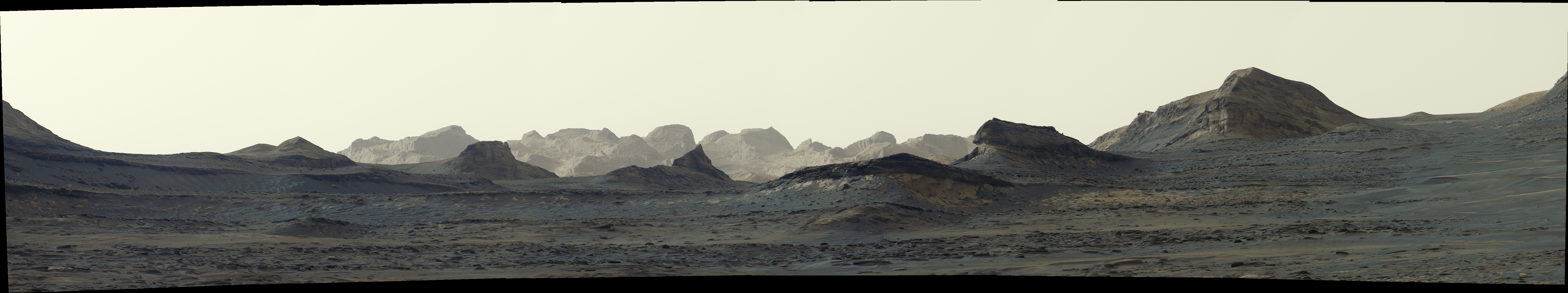 the nearby crags and distant peaks seen by curiosity as the sky looks white the nearby crags and distant peaks seen by curiosity as the sky looks white