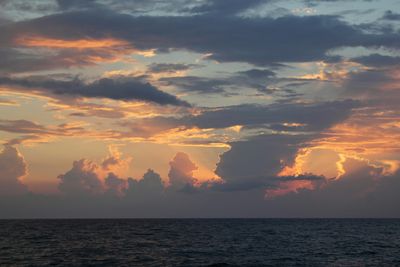 Moody skies hang over the ocean.