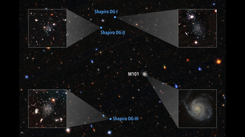 a full view of the area of the sky with four inset one showing the beautiful spiral that is the pinwheel. the other three showing some amorphous pale concentrations of stars